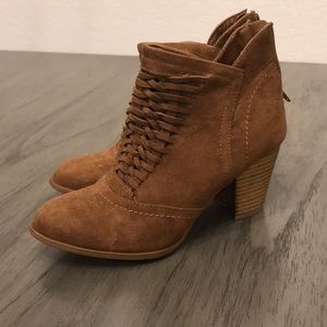 Brown booties with heel.